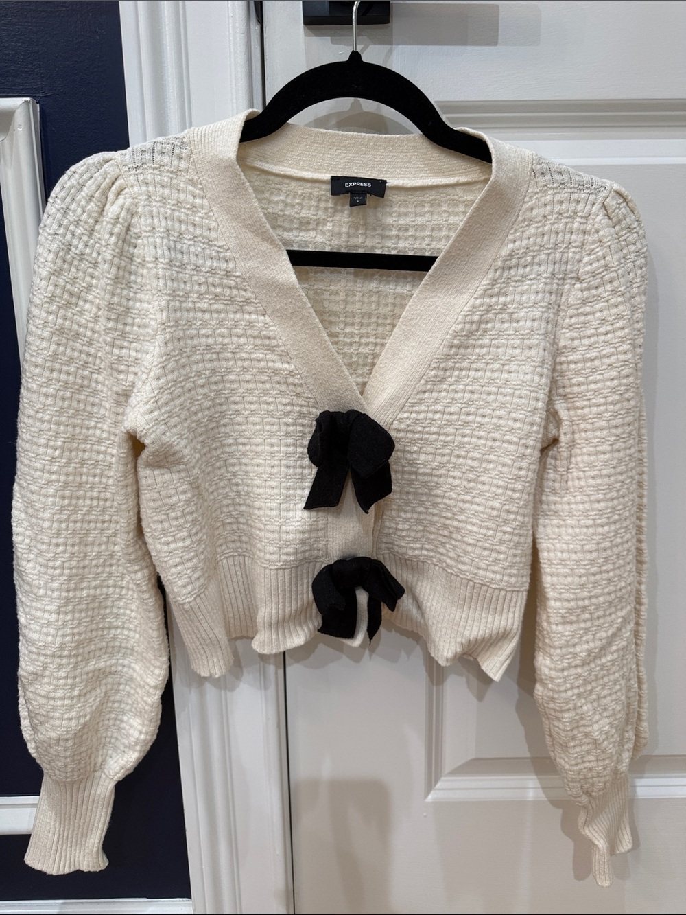 Express Cream Knit Cardigan with Black Bow Closures